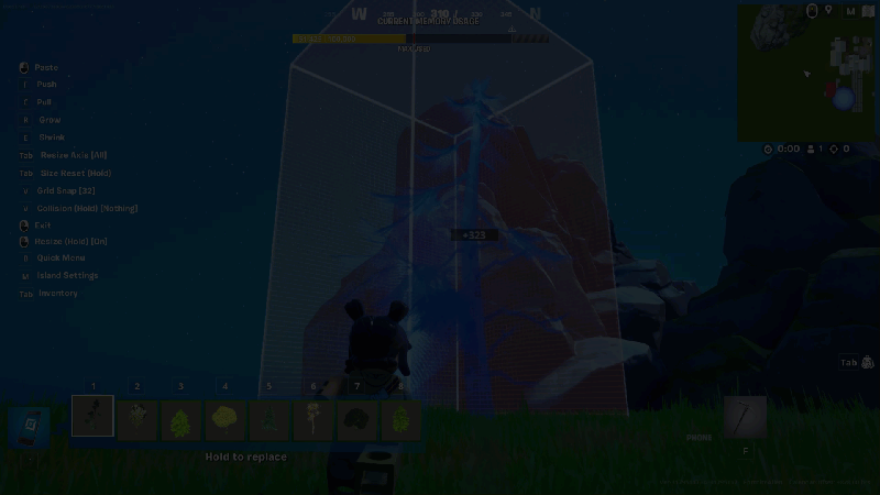 Placing trees on a LEGO template island.